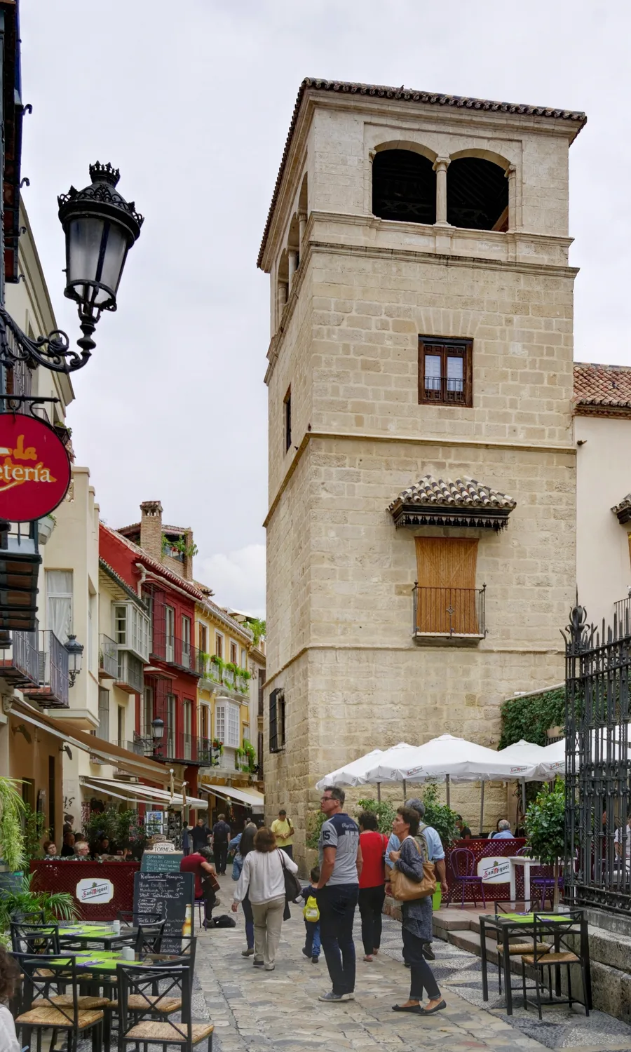 The tower of the Palacio de Buenavista rising over Calle San Agustín in the old town of Málaga